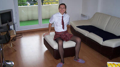 Cute wife dressing like a schoolgirl to please the hubby