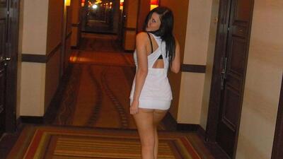 Young wife nude in hotel hallway